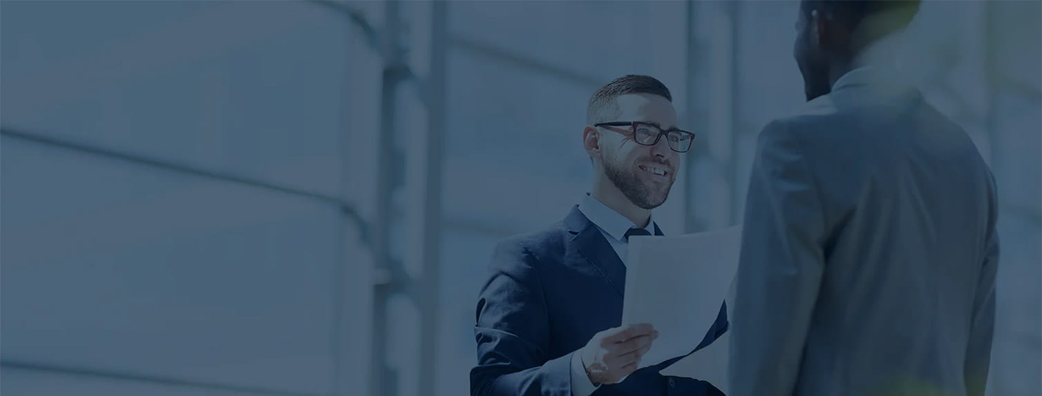 Two businessmen chatting