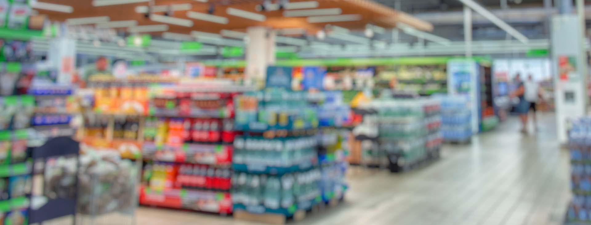 aisles of beverages in a grocery store