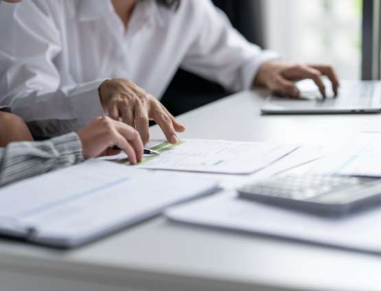 business person reviewing financial reports
