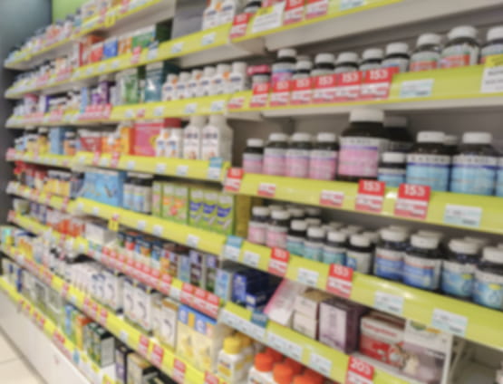 Blurred image of shelves with supplements