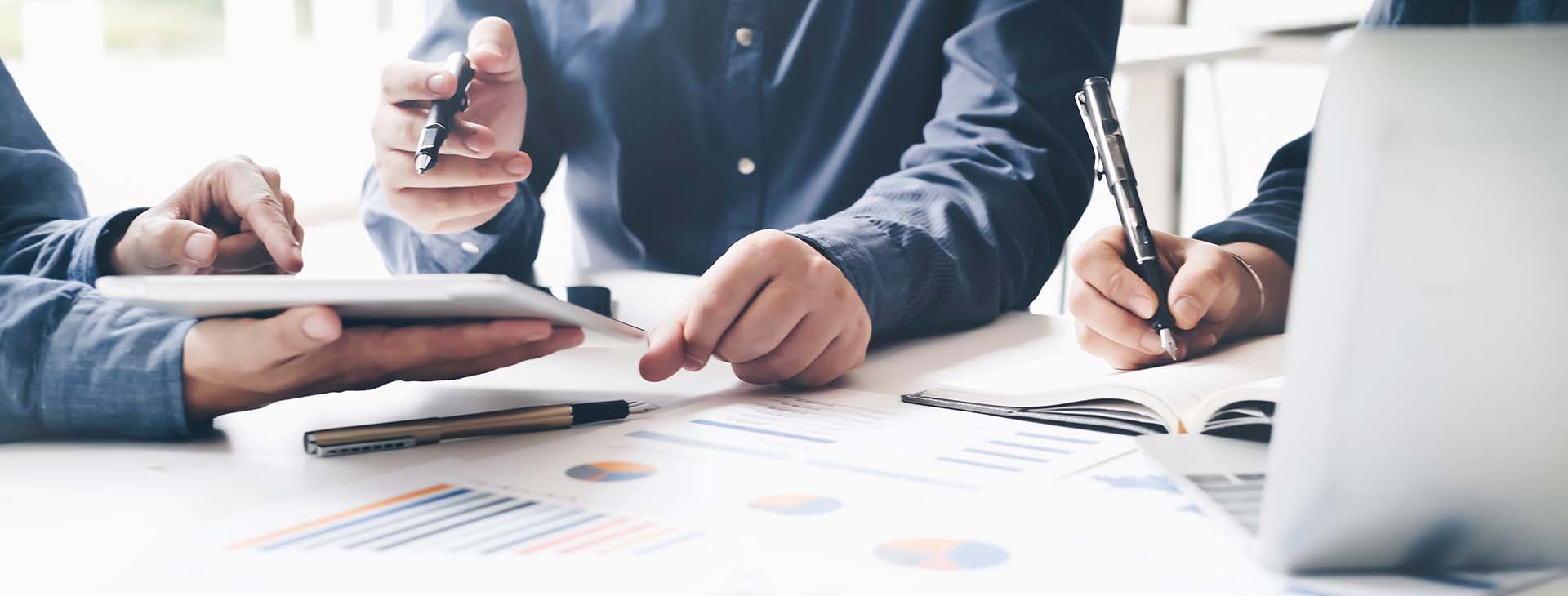 business professionals reviewing financial reports