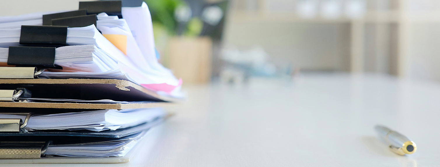 stack of financial reports