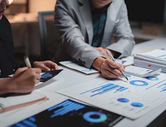 Business professionals analyzing financial data