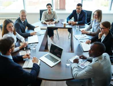 business executives meeting in a boardroom