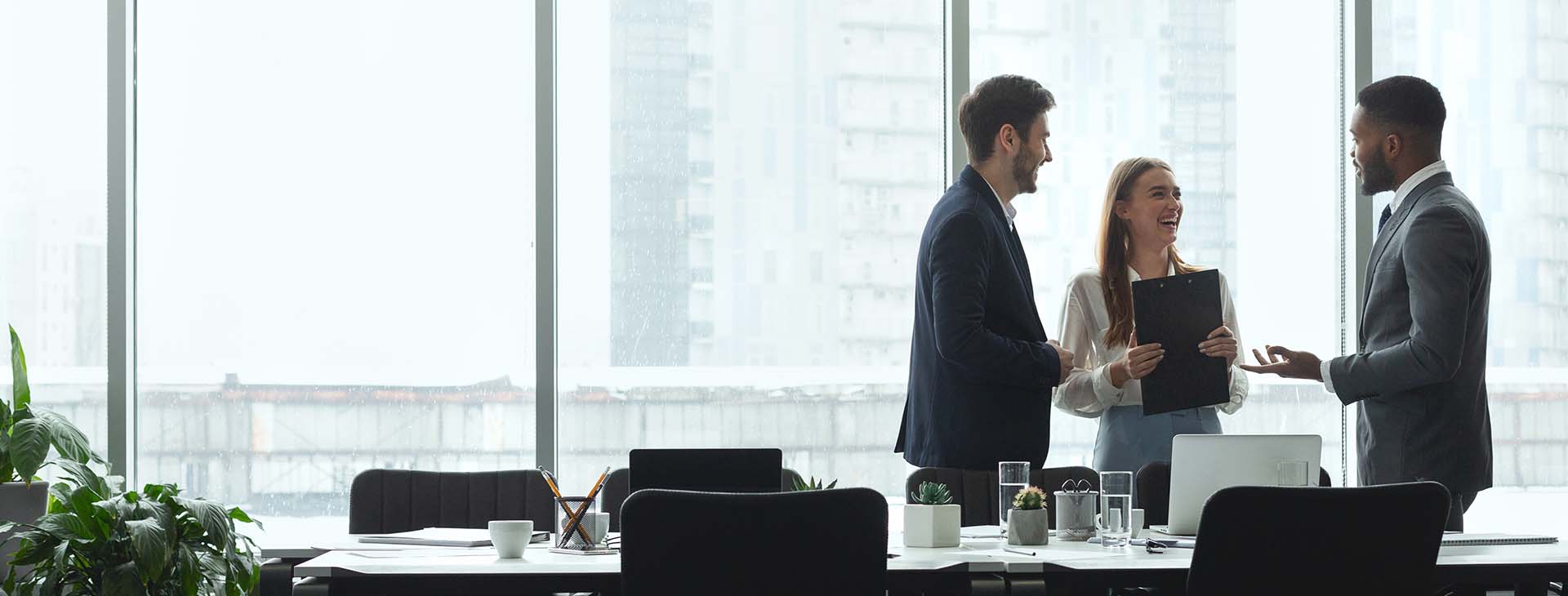 Businesspeople talking in office conference room