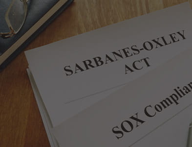 Desk with SOX documents on it