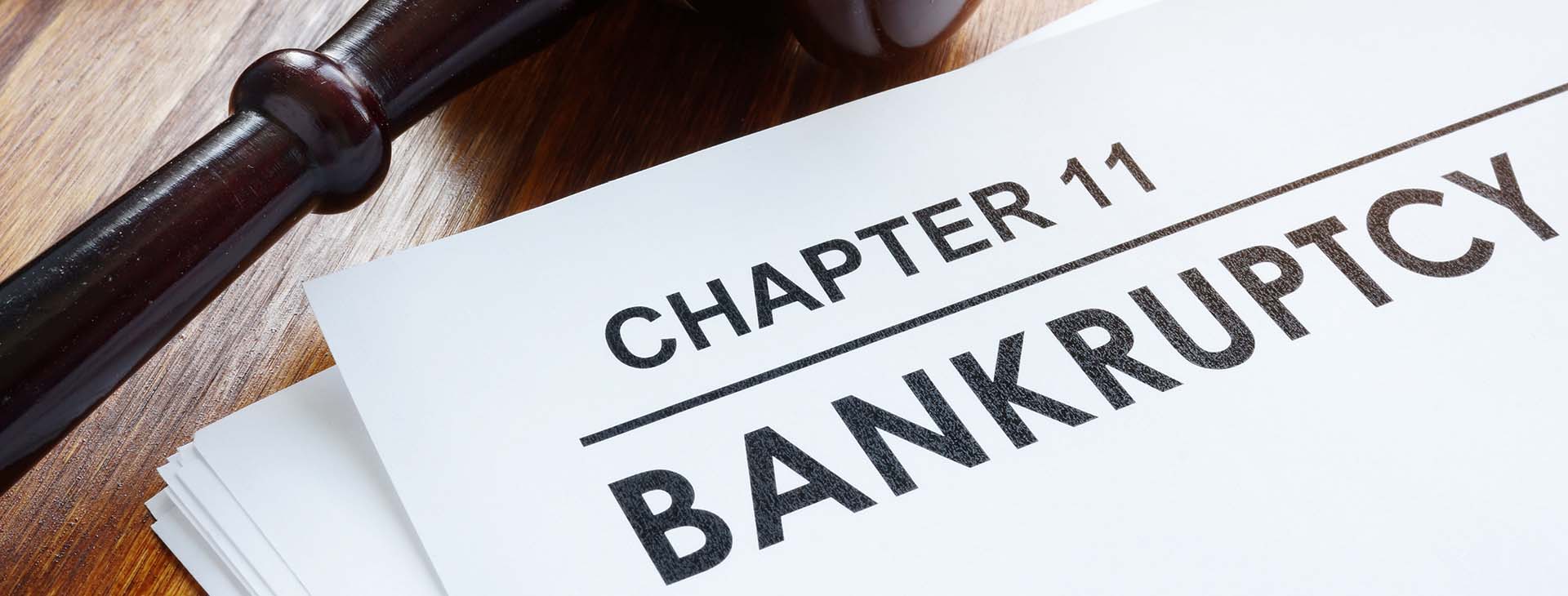 Stack of papers about chapter 11 bankruptcy