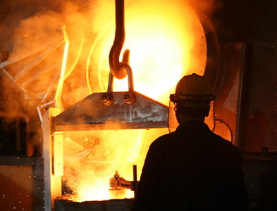 Image of man making steel
