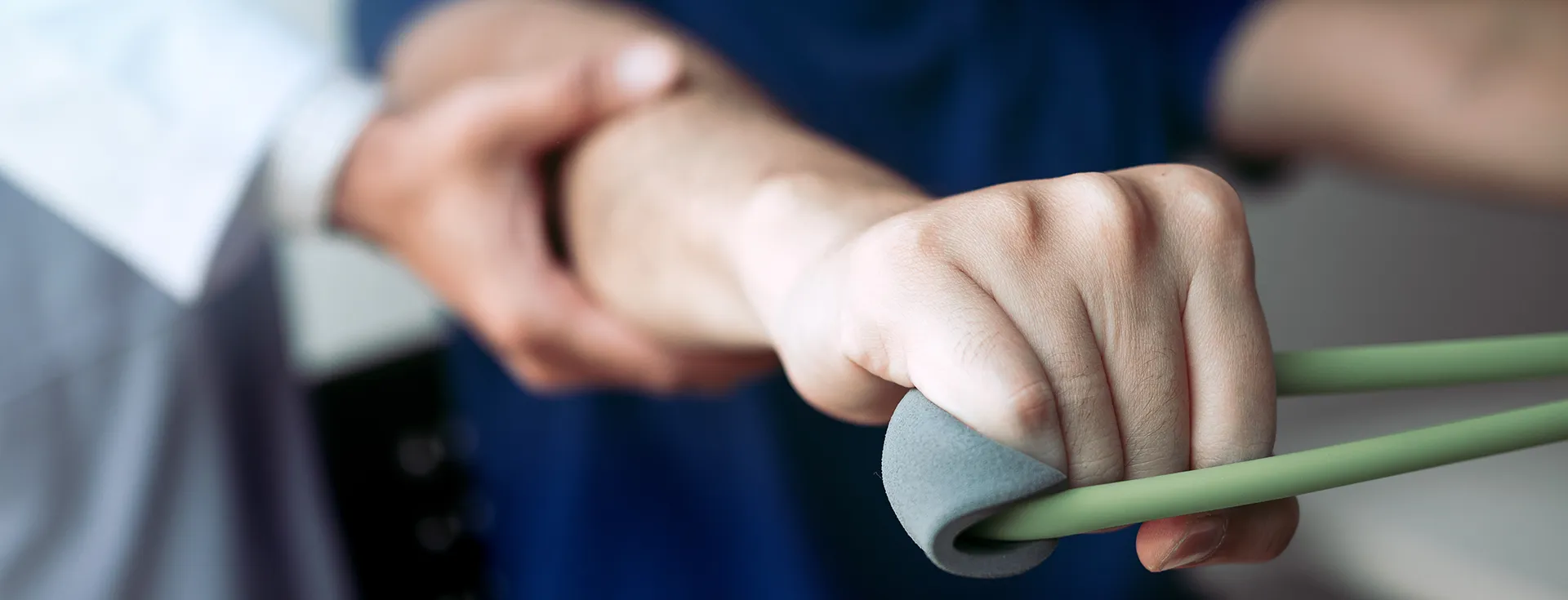 physical therapist and patient exercising